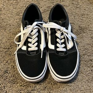 Black and white Vans sneakers